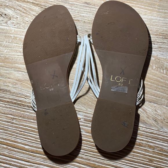 Ann Taylor Loft white leather strappy flip flop sandals w/ gold bumblebee charm - Picture 7 of 13